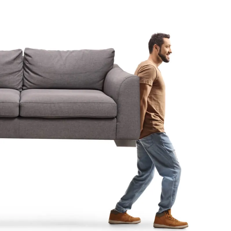 Man moving sofa | Simple Flooring Solutions